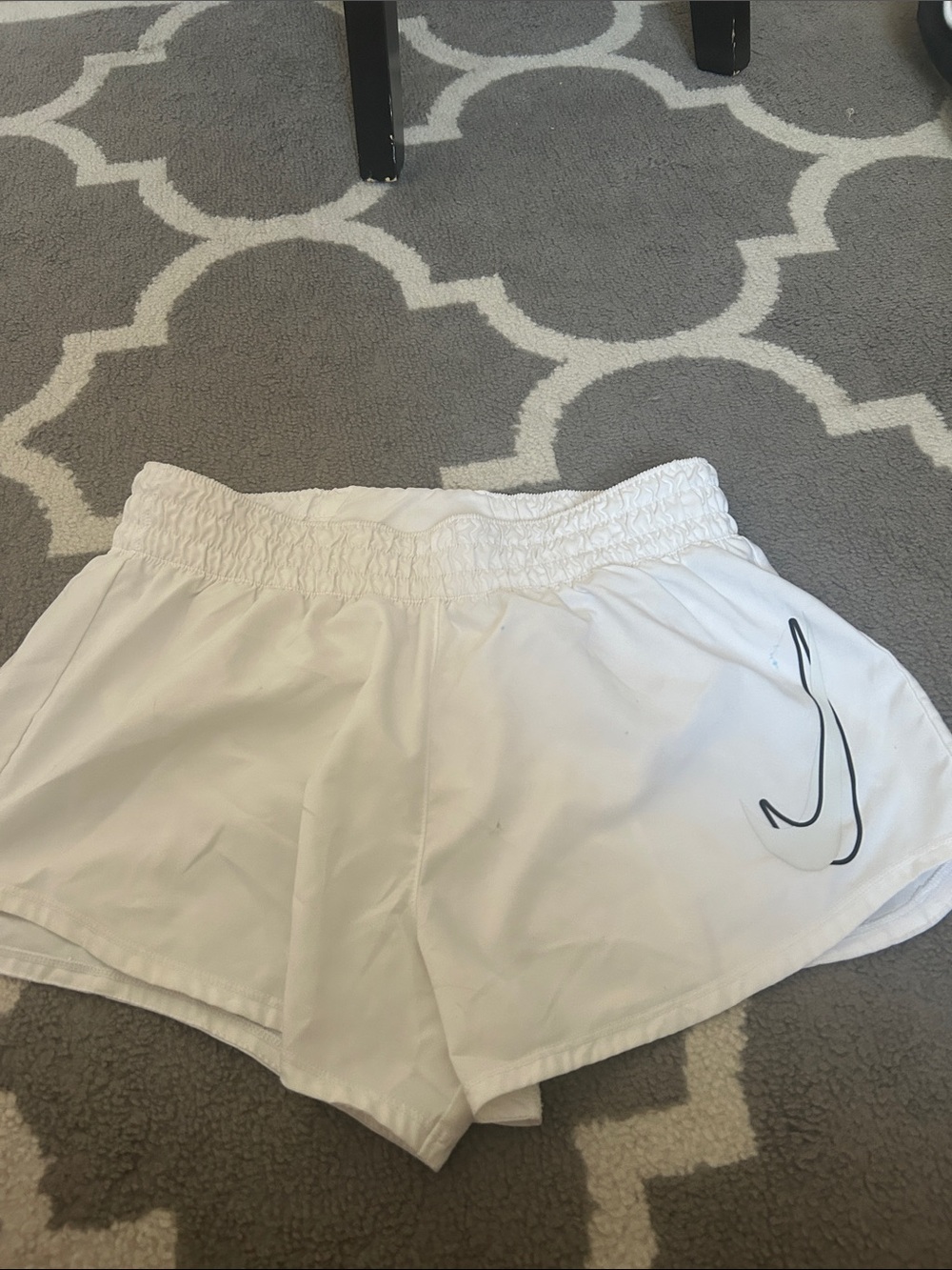 Nike White Athletic Shorts with Black Swoosh